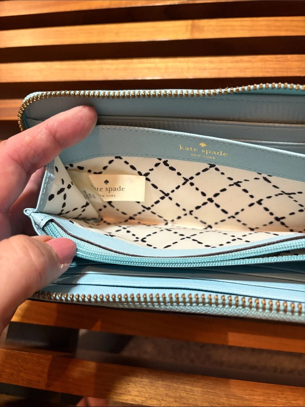 kate spade pale blue zip-around wallet